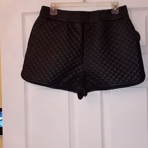 Quilted black shorts Black leather like pants